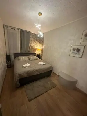 Un ou plusieurs lits dans un hébergement de l'établissement Maison individuelle, 3chambres, avec parking
