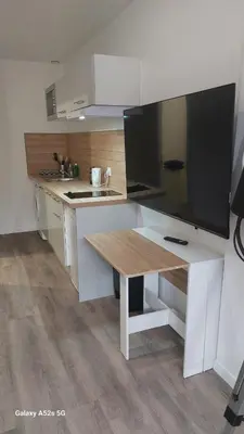 Cuisine ou kitchenette dans l'établissement Studio 5 moderne avec WiFi et stationnement