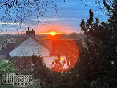 Lever ou coucher de soleil vu de l'appartement ou à proximité