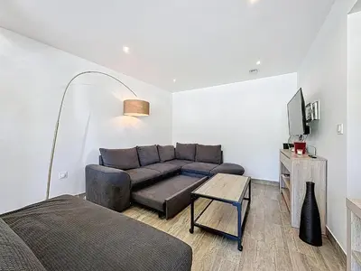 Coin salon dans l'établissement Maisonnette 49m2 à 5 minutes de chantilly