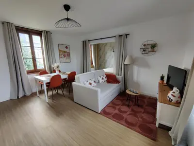 Un ou plusieurs lits dans un hébergement de l'établissement Studio Cosy
