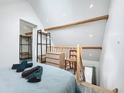 Un ou plusieurs lits dans un hébergement de l'établissement Maisonnette 36m2 à 5 minutes de Chantilly