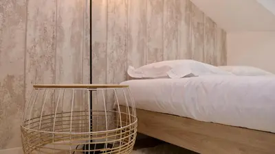 Un ou plusieurs lits dans un hébergement de l'établissement Studio pratique et cosy Rouen centre