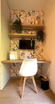 Télévision ou salle de divertissement dans l'établissement L'ombelle - Studio vert d'eau avec petit extérieur