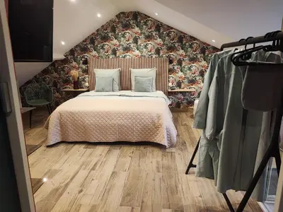Un ou plusieurs lits dans un hébergement de l'établissement Loft envie deux