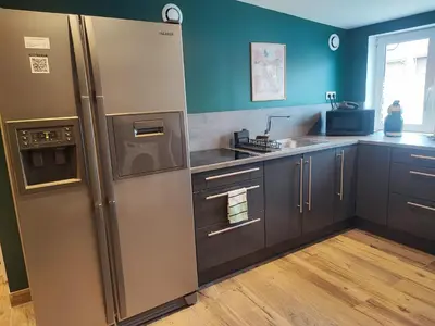 Cuisine ou kitchenette dans l'établissement Loft envie deux
