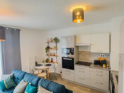 Cuisine ou kitchenette dans l'établissement Le Cosy Chic - F2