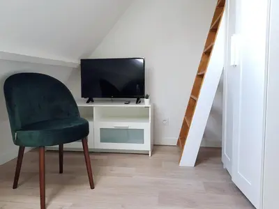Télévision ou salle de divertissement dans l'établissement Le Fleury Studio Calme Proche de Rouen