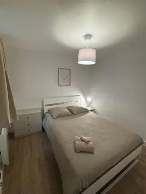 Un ou plusieurs lits dans un hébergement de l'établissement charmant appartement 4 pers hyper centre, au calme