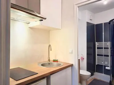 Cuisine ou kitchenette dans l'établissement Le Ricard