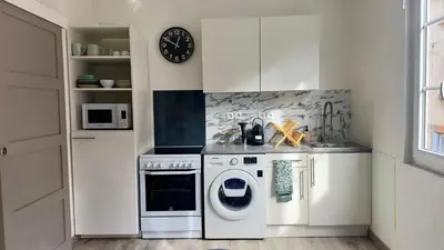 Cuisine ou kitchenette dans l'établissement Le Coignebert