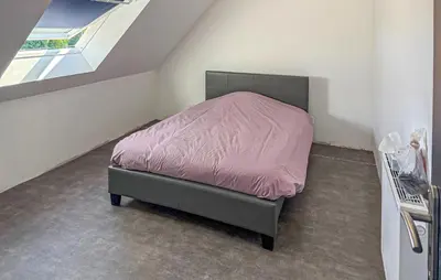 Un ou plusieurs lits dans un hébergement de l'établissement Maison Campagne Normandie