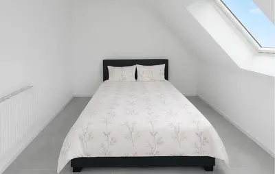 Un ou plusieurs lits dans un hébergement de l'établissement Maison Campagne Normandie