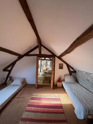Un ou plusieurs lits dans un hébergement de l'établissement La ferme de Jose