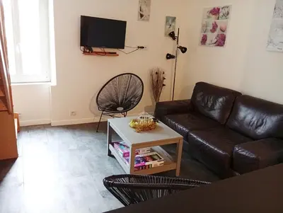 Télévision ou salle de divertissement dans l'établissement Duplex aux Portes de Seine