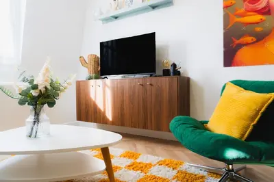 Télévision ou salle de divertissement dans l'établissement Suite cozy pour pros et séjours confort