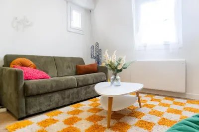 Coin salon dans l'établissement Suite cozy pour pros et séjours confort