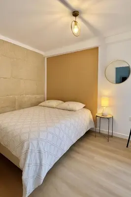Un ou plusieurs lits dans un hébergement de l'établissement Saphir Apartment 2 rooms Senlis Centre Parc Astérix