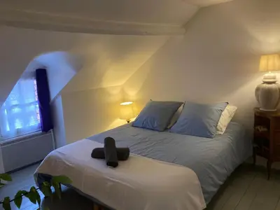 Un ou plusieurs lits dans un hébergement de l'établissement Maison Cosy et Typique au Coeur de Maule