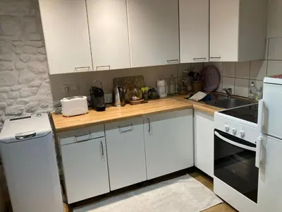 Cuisine ou kitchenette dans l'établissement Maison Cosy et Typique au Coeur de Maule