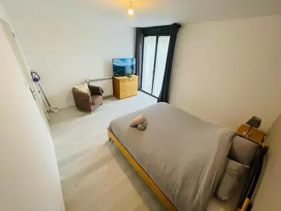 Un ou plusieurs lits dans un hébergement de l'établissement Maison cosy Jardin des Plantes - 9 voyageurs - 388