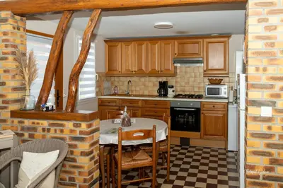 Cuisine ou kitchenette dans l'établissement oreedesetangs80