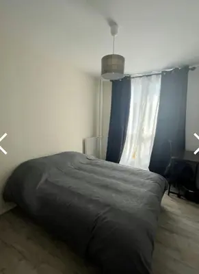Un ou plusieurs lits dans un hébergement de l'établissement Bel Appartement de 78m2