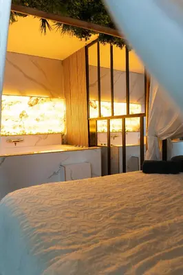 Un ou plusieurs lits dans un hébergement de l'établissement Spa and relaxation, love room