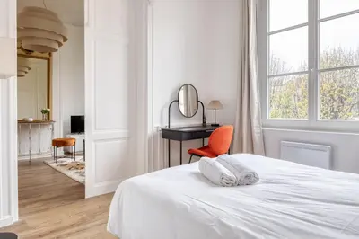 Un ou plusieurs lits dans un hébergement de l'établissement Le Lauroise magnifique F2 place des Carmes