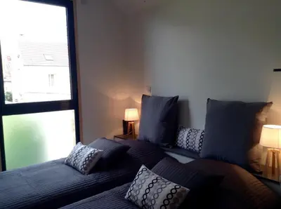 Coin salon dans l'établissement Les Co Gîte
