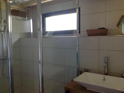 Salle de bains dans l'établissement Les Co Gîte