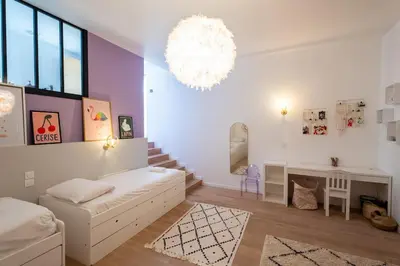 Un ou plusieurs lits dans un hébergement de l'établissement Sublime maison in Mezy sur seine