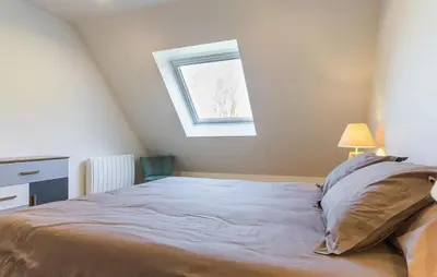 Un ou plusieurs lits dans un hébergement de l'établissement Amazing Home In Acquigny