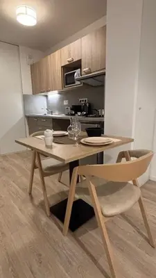 Cuisine ou kitchenette dans l'établissement Cosy Diem Franconville