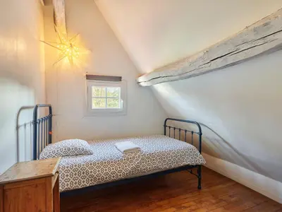 Un ou plusieurs lits dans un hébergement de l'établissement Holiday Home La Ferme by Interhome
