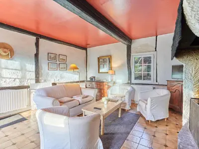 Coin salon dans l'établissement Holiday Home La Ferme by Interhome