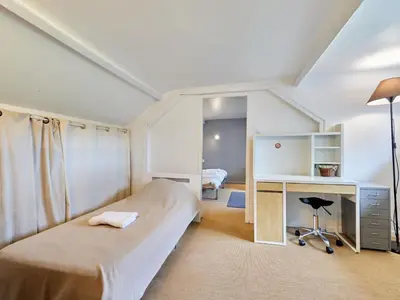 Un ou plusieurs lits dans un hébergement de l'établissement Holiday Home La Musardière by Interhome