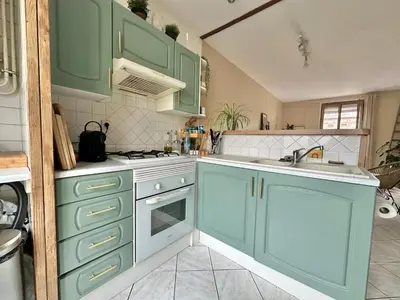 Cuisine ou kitchenette dans l'établissement Maison avec jardin - 10 min de Rouen