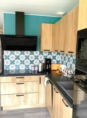 Cuisine ou kitchenette dans l'établissement La petite cauchoise