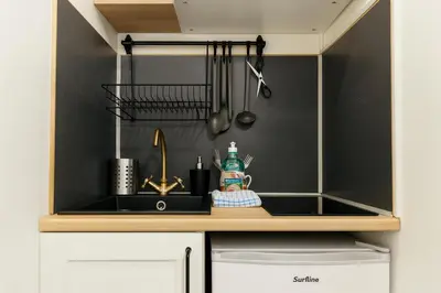 Cuisine ou kitchenette dans l'établissement Le Cloudy Cocon calme hypercentre - 418