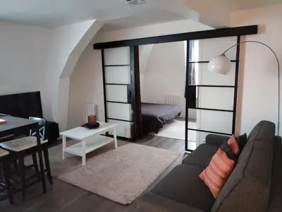 Coin salon dans l'établissement Appartement charmant et moderne à Poissy
