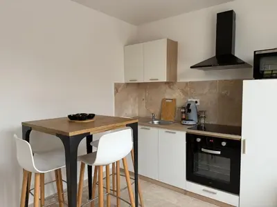 Cuisine ou kitchenette dans l'établissement Le prestige - Charmant T2 neuf avec Terrasse