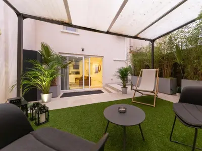 Coin salon dans l'établissement Chambre XXL, Luxueux, Home Cinéma, Jardin