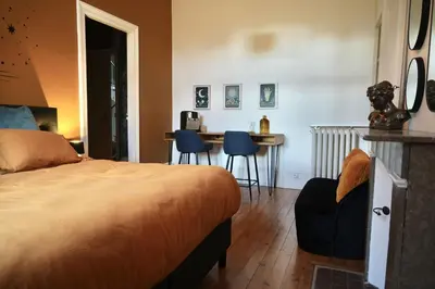 Un ou plusieurs lits dans un hébergement de l'établissement Domaine des Monts de la Baie