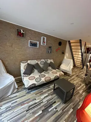Coin salon dans l'établissement Sweet Home
