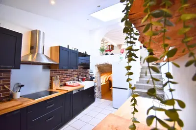 Cuisine ou kitchenette dans l'établissement Chambly Green Family House