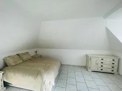 Un ou plusieurs lits dans un hébergement de l'établissement Appartement lumineux garage privé centre-ville