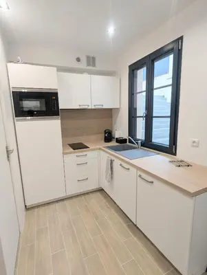 Cuisine ou kitchenette dans l'établissement Studio calme et équipé proche Paris