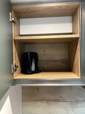 Cuisine ou kitchenette dans l'établissement Les cottages du Manoir Logement 2