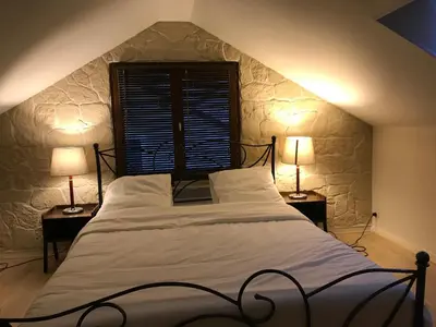 Un ou plusieurs lits dans un hébergement de l'établissement Maison Coquille Moulin